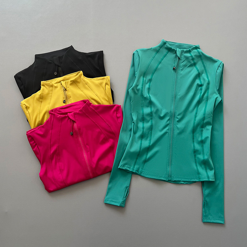 Pilates Yoga Jacket - เสื้อแจ็คเก็ตออกกำลังกายแขนยาวแบบซิปเต็มตัวสำหรับผู้หญิง มีช่องสำหรับนิ้วโป้ง ทรงเข้ารูป แห้งเร็ว เหมาะสำหรับวิ่ง ยิม